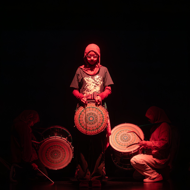 Image of a Fusion Percussion member performing at an event
